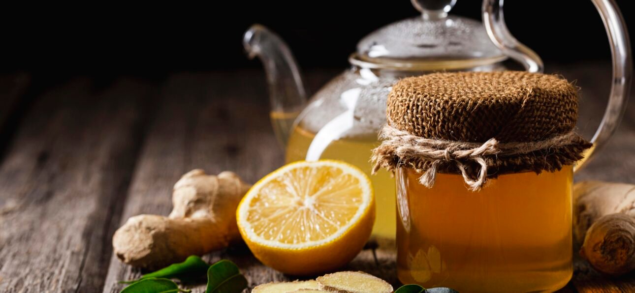 Organic lemon honey squash bottle with fresh lemons and honey, natural healthy drink for refreshing hydration in India