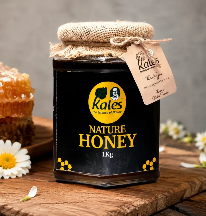 Buy Pure Honey Online in India – jar of pure honey with honeycomb and flowers